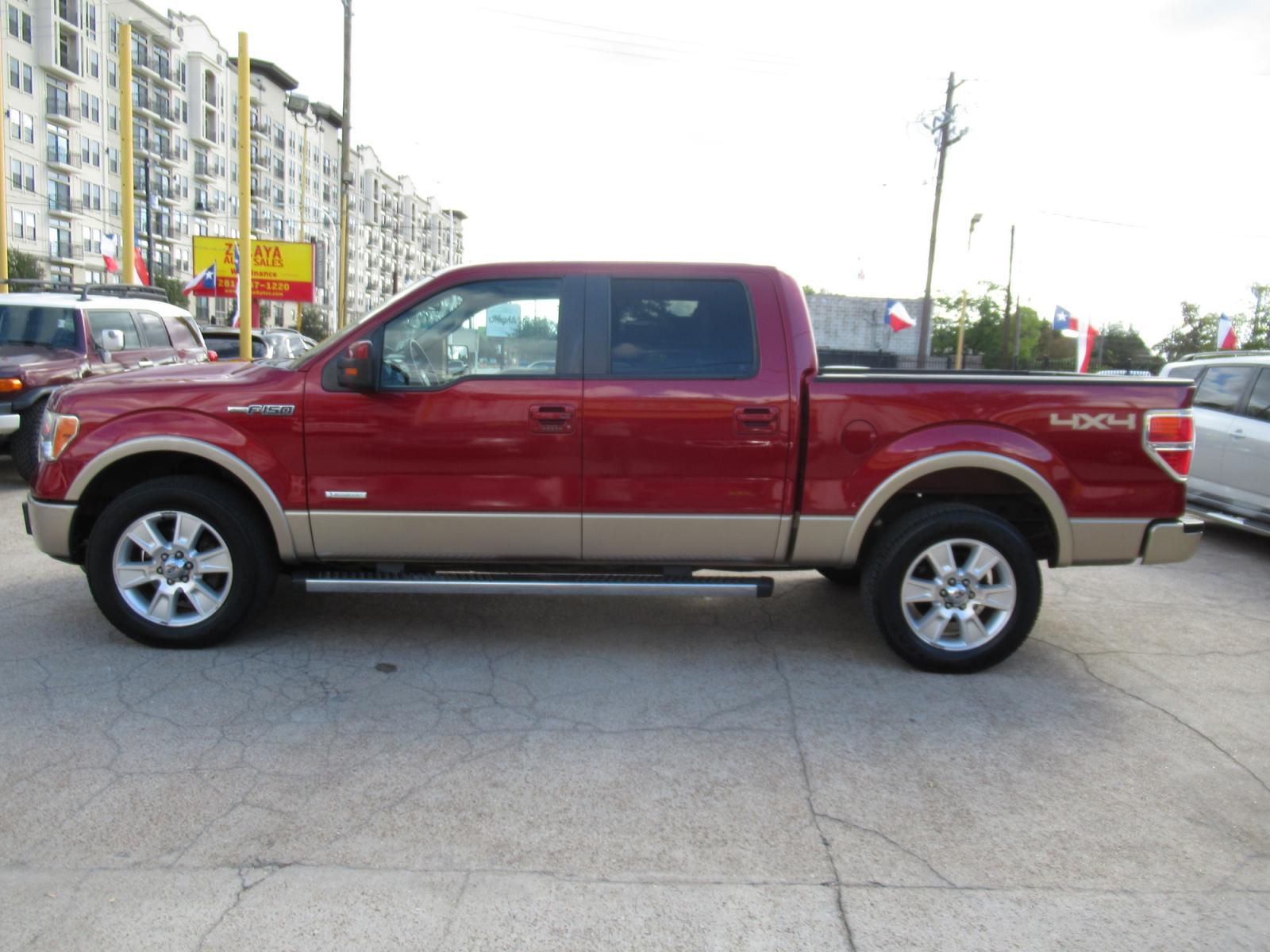 2013 Red /Tan Ford F-150 Lariat (1FTFW1ET3DK) with an 3.5 engine, Automatic transmission, located at 1511 North Shepherd Dr., Houston, TX, 77008, (281) 657-1221, 29.798361, -95.412560 - 2013 FORD F-150 LARIAT VIN: 1FTFW1ET3DKD79524 1 F T F W 1 E T 3 D K D 7 9 5 2 4 CREW PICKUP 3.5L V6 F DOHC 24V GASOLINE REAR WHEEL DRIVE W/ 4X4 - Photo #36